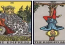 Empress and Hanged Man birth cards positioned together in a spiritual tarot reading setup