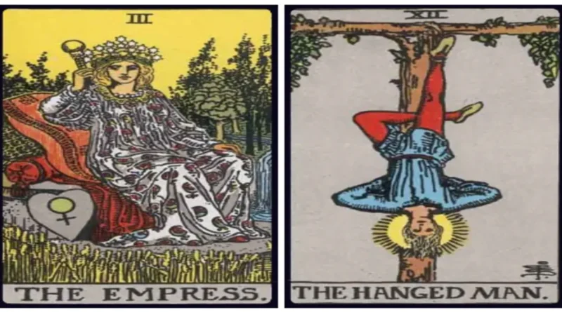 Empress and Hanged Man birth cards positioned together in a spiritual tarot reading setup