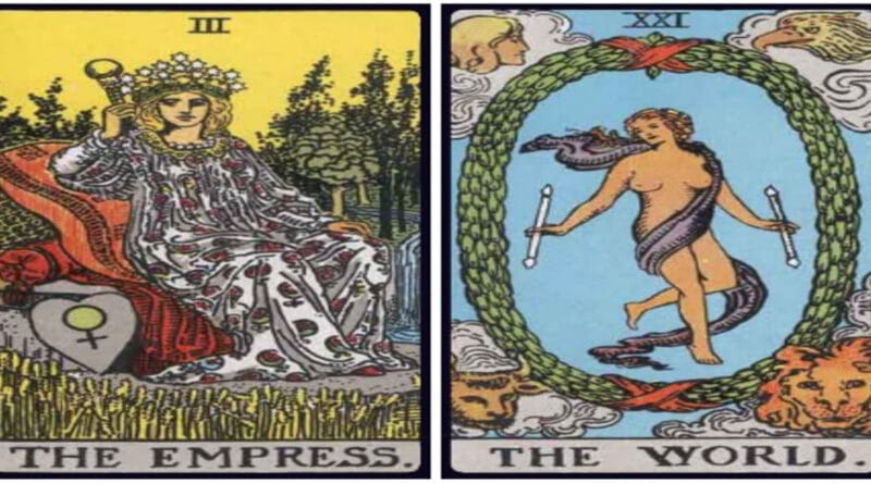 Empress and World birth cards side by side on a decorative tarot cloth in a reading layout